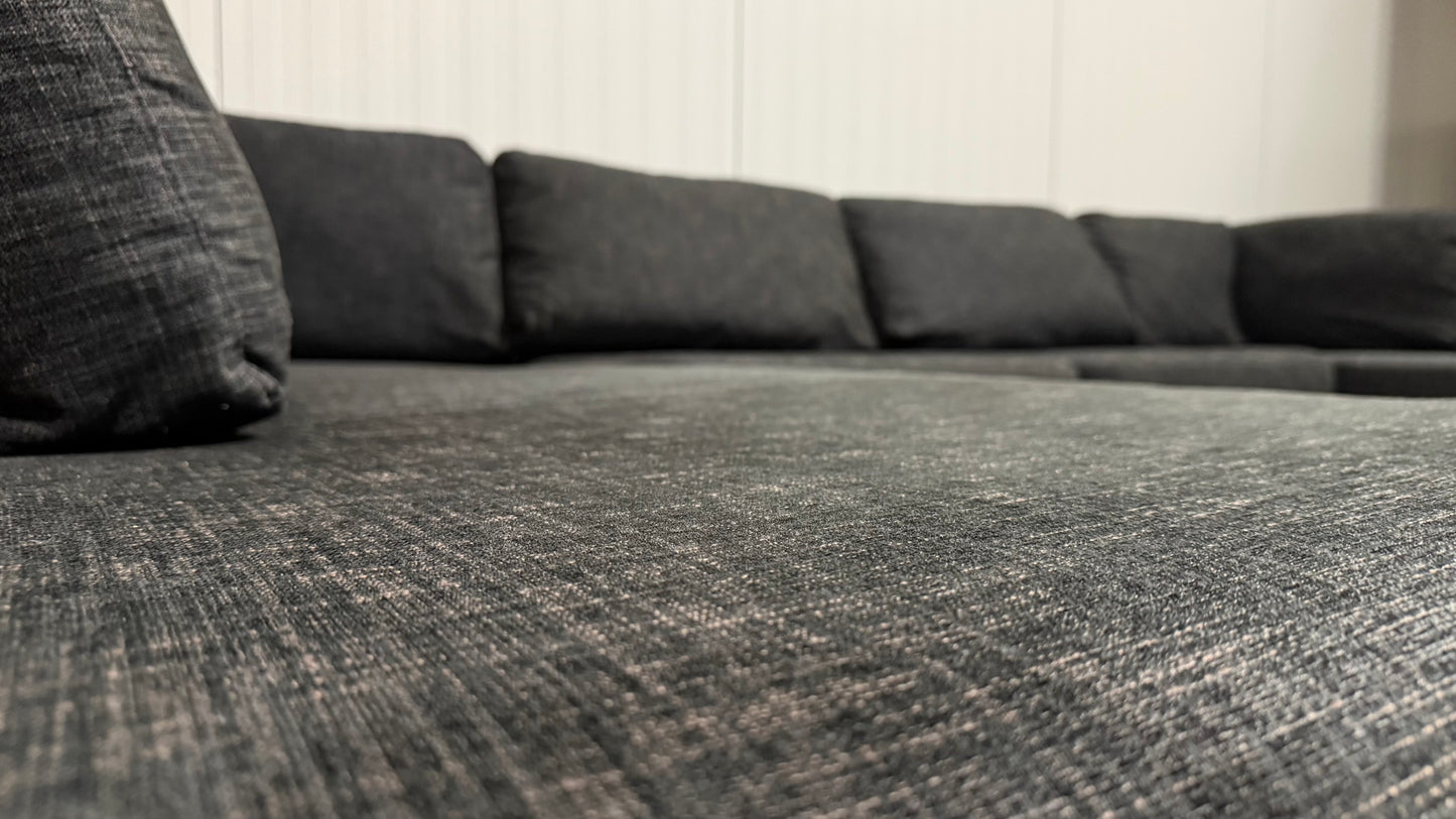Stor svart U-soffa