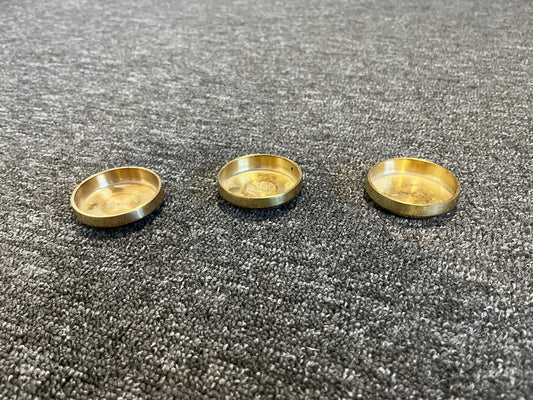 Möbelunderlägg i mässing