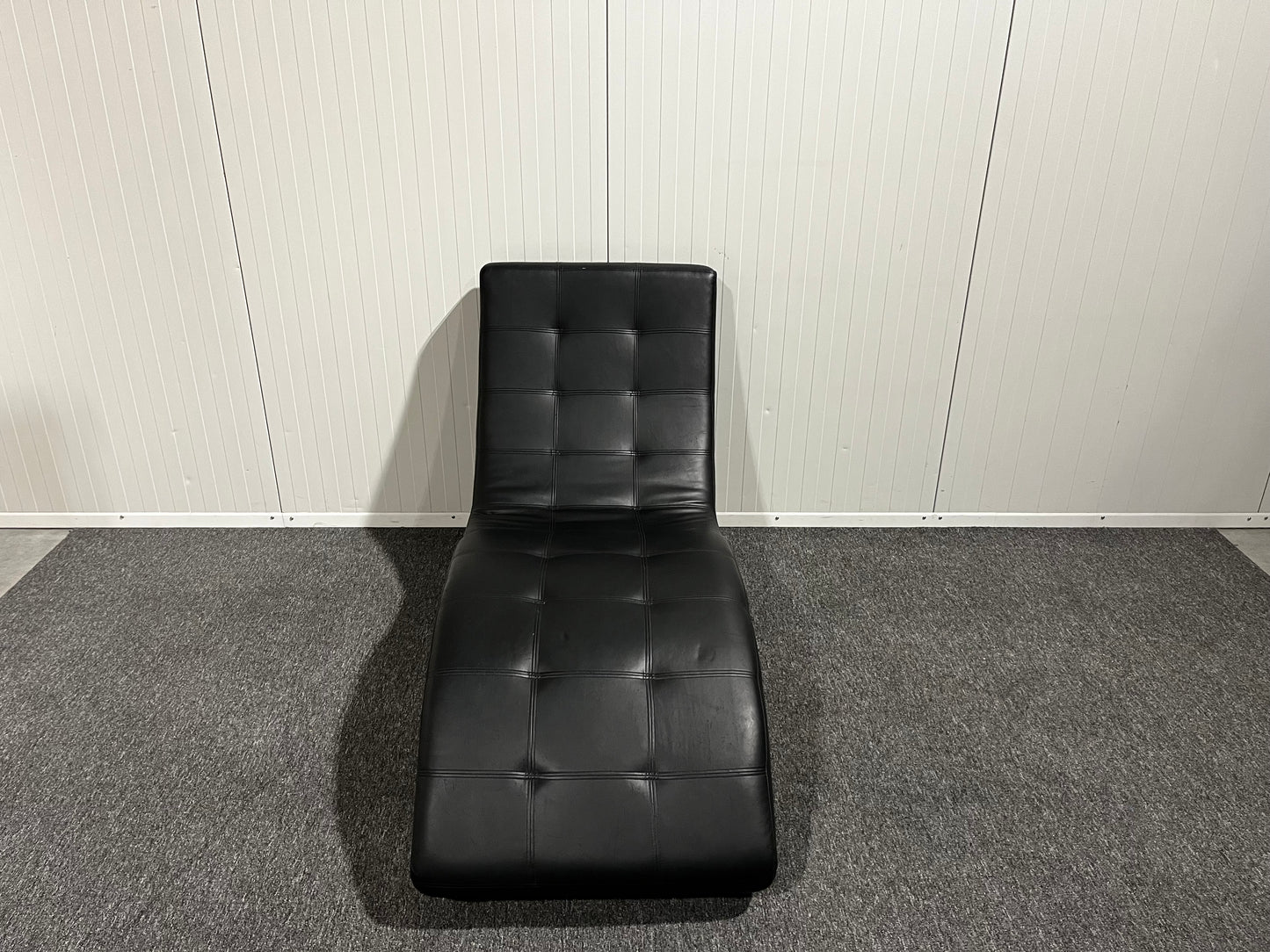 Svart designerfåtölj