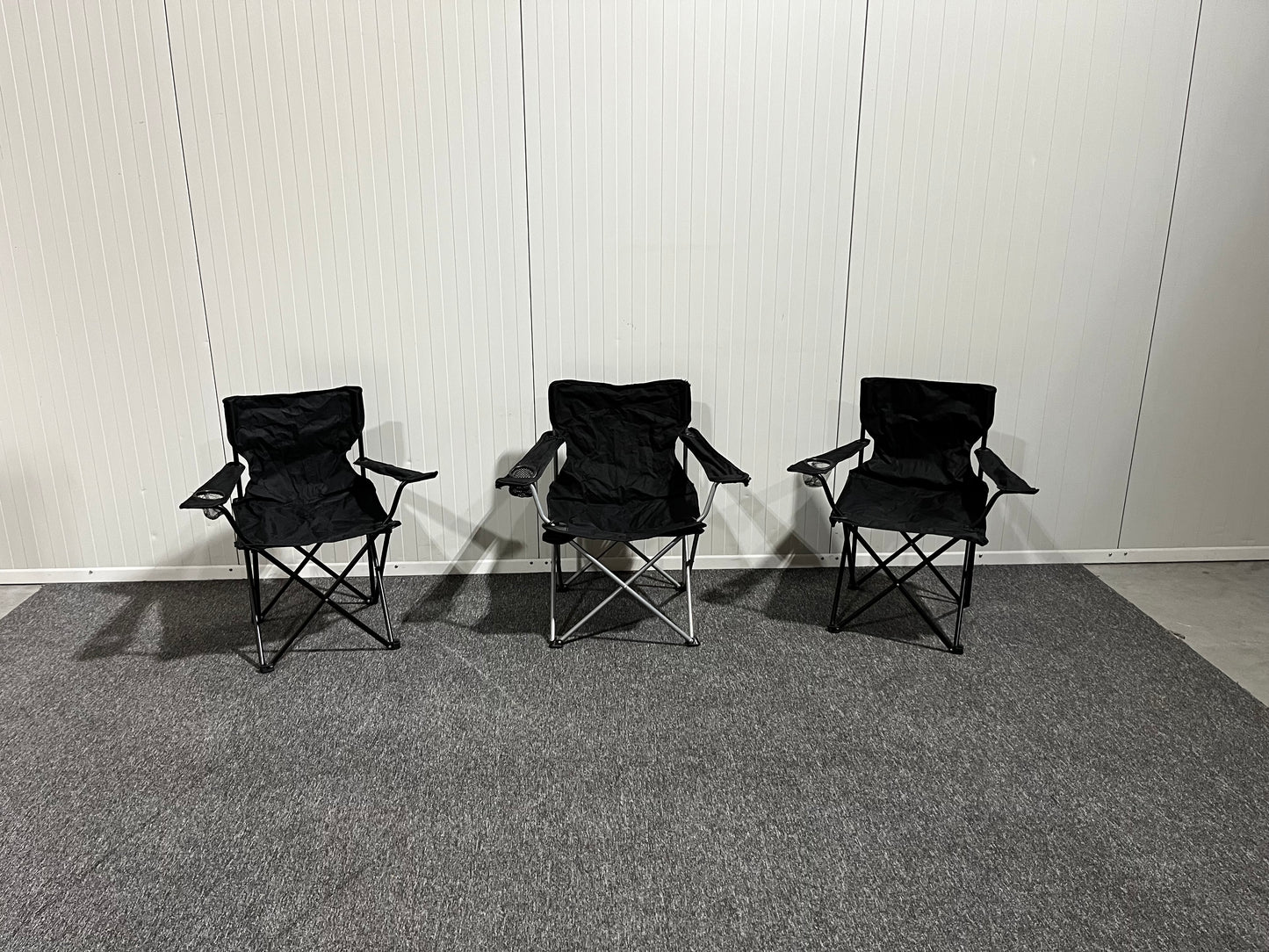 Svarta campingstolar