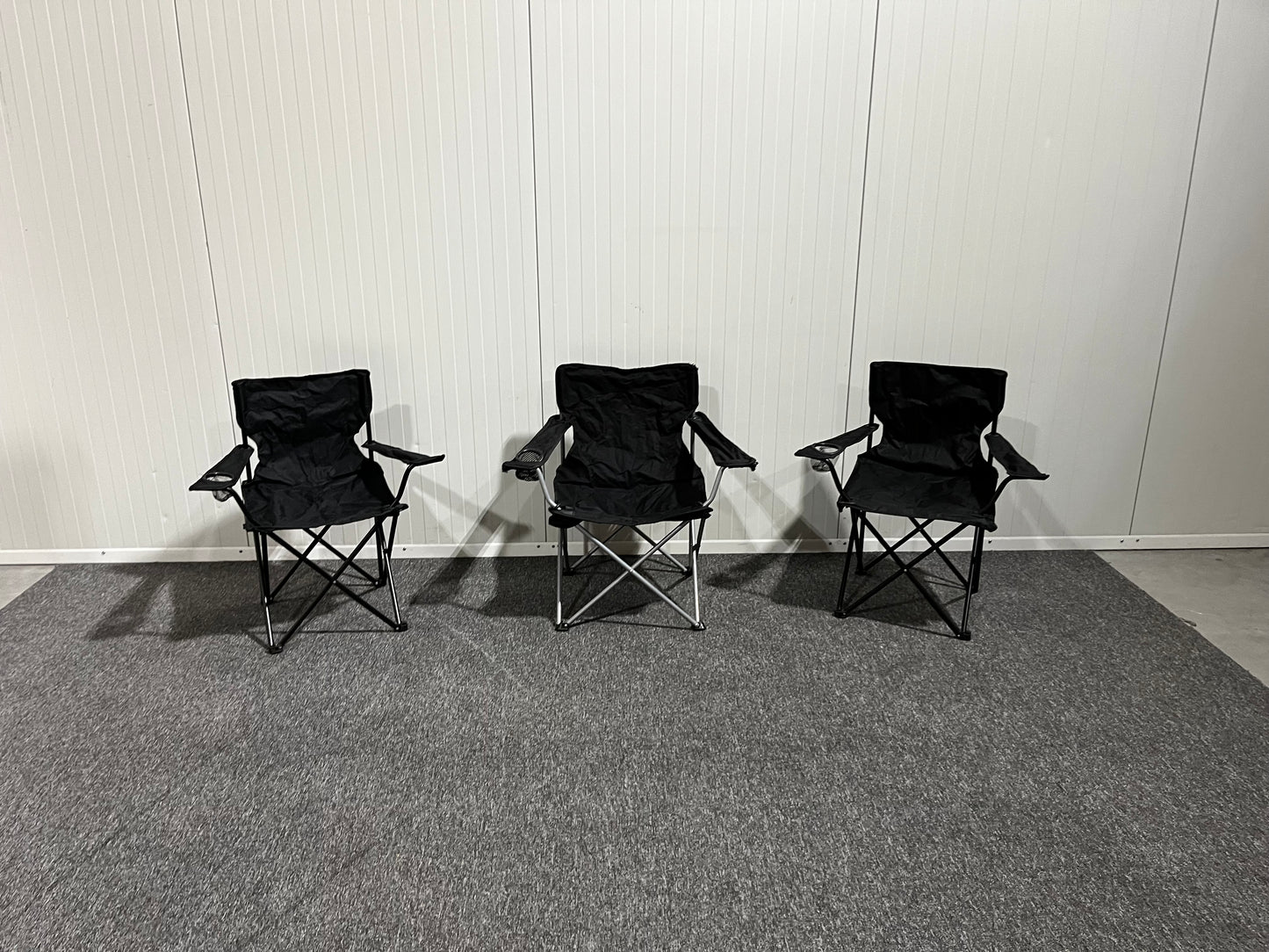 Svarta campingstolar