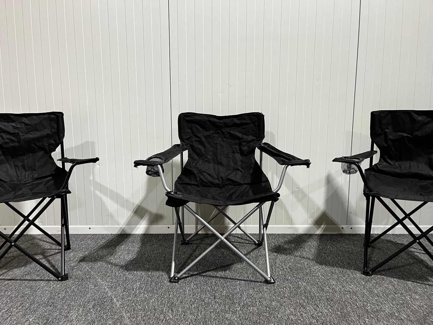 Svarta campingstolar