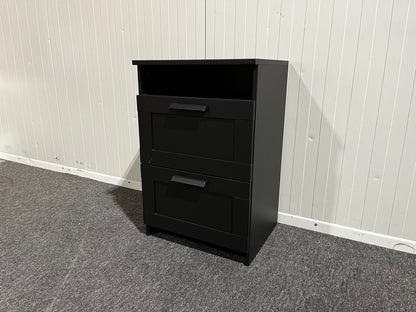 Svart byrå med två lådor
