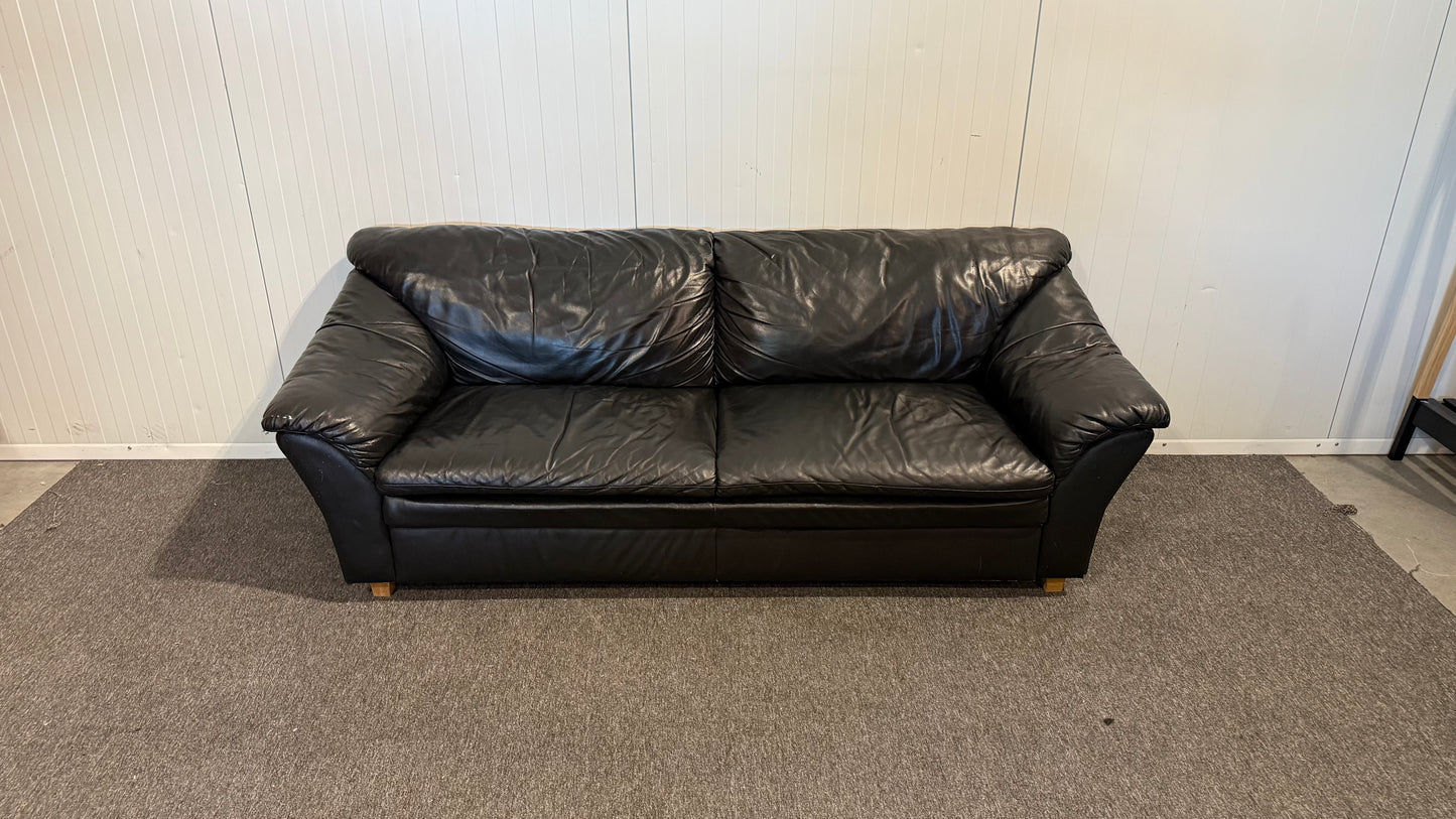 Begagnad svart 3-sits lädersoffa