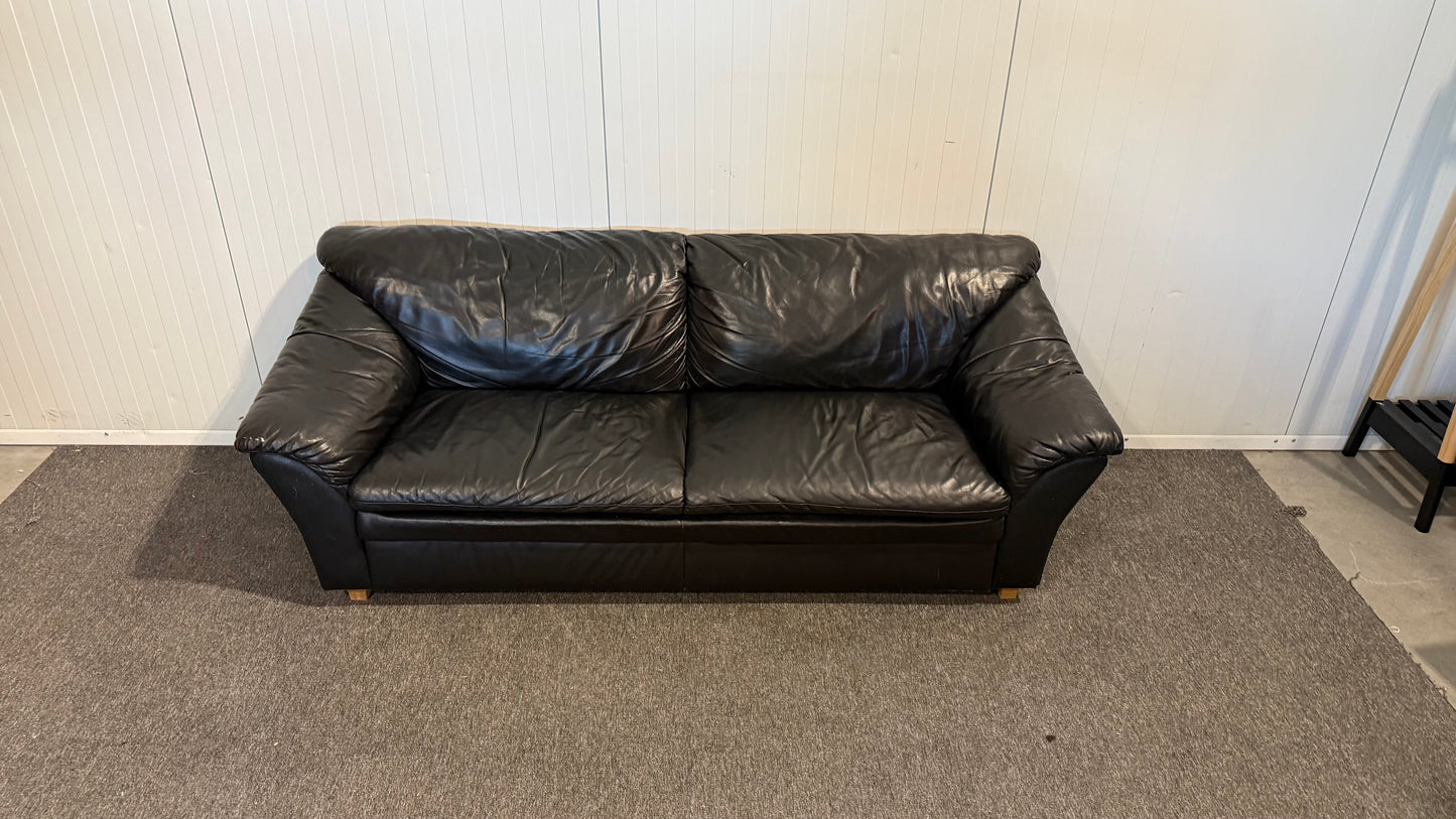Begagnad svart 3-sits lädersoffa