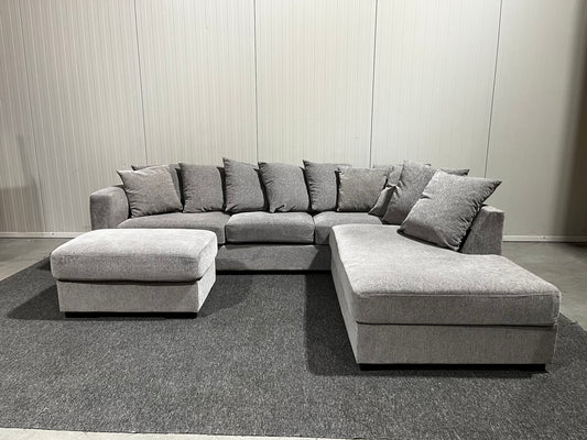 Grå soffa med divan och fotpall inklusive