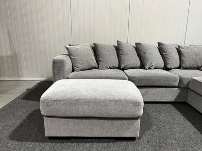 Grå soffa med divan och fotpall inklusive