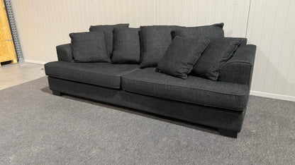 Begagnad svart tresits soffa