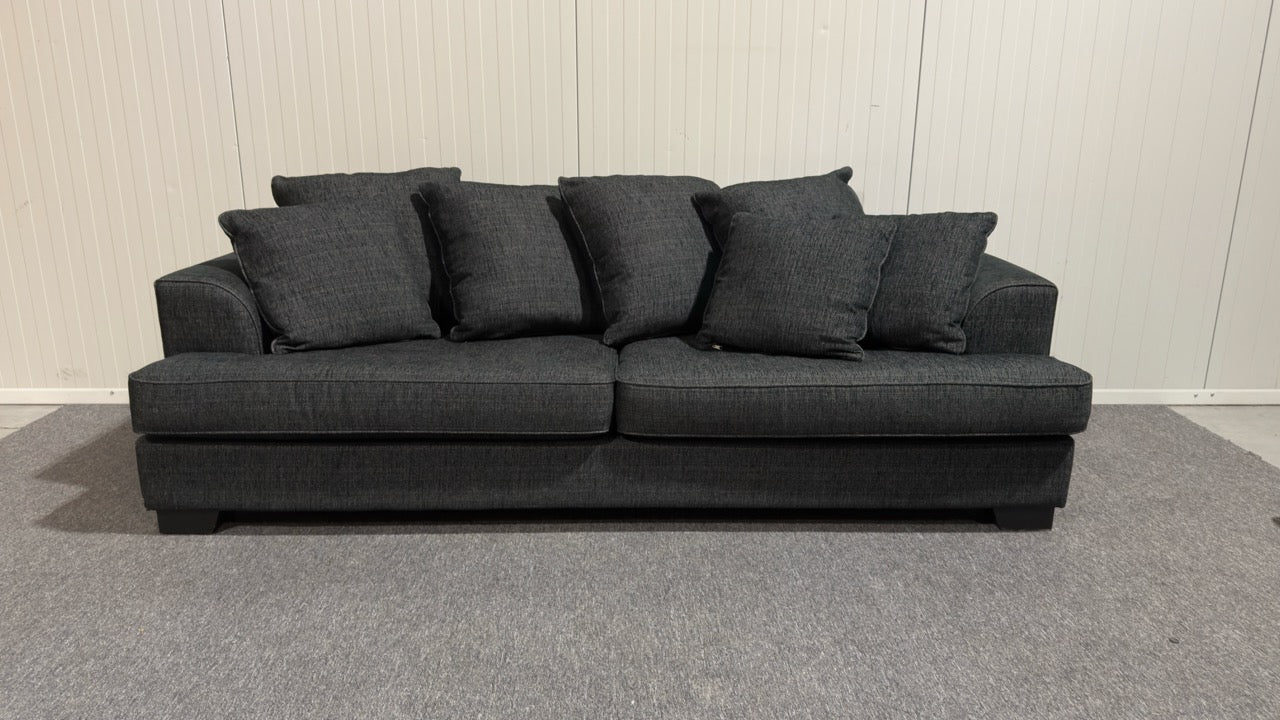 Begagnad svart tresits soffa