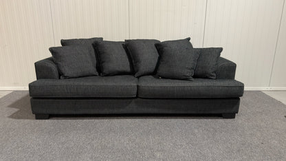 Begagnad svart tresits soffa