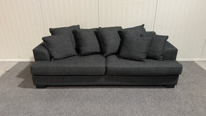 Svart tresits soffa